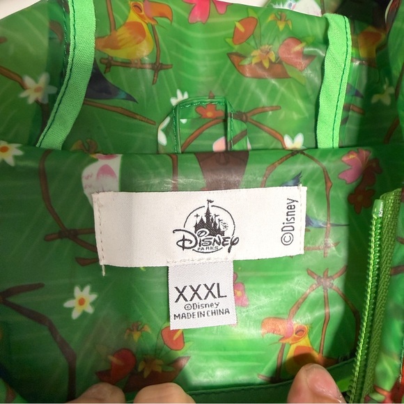 Disney Womens 3XL Green Hooded Rain Jacket Enchanted Tiki Room - Picture 2 of 7